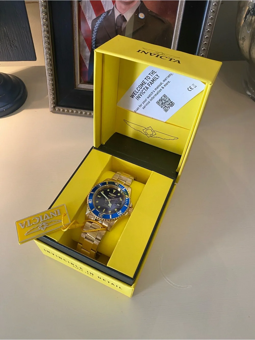 Invicta Gold Tone Watch with Blue Bezel and Dial